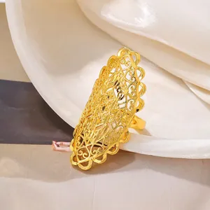 Detailed close-up of hollow lace texture and intricate gold-plated filigree craftsmanship