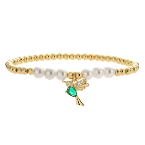 Elegant gold beaded bracelet with white pearls and a sparkling green hummingbird charm