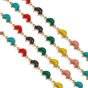 Detailed view of 18K gold plated stainless steel chains with colorful enamel moon charms