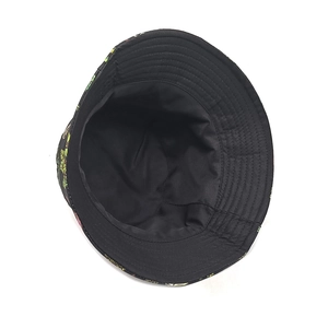 Detailed interior view of a bucket hat showing fine stitching and black lining
