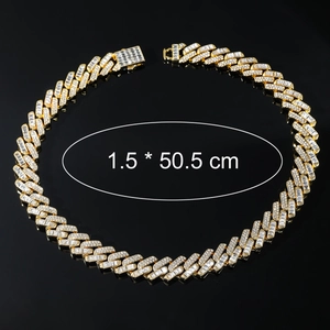 Close-up of 15mm gold Cuban link necklace featuring iced out crystals and spring clasp
