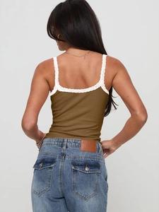 Detail of brown ribbed camisole with lace trim and spaghetti straps on a model