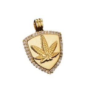 Pendaglio a scudo vintage in oro 14K con rilievo foglia e intarsio di strass lucidi