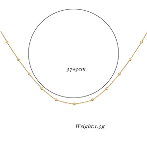 Close-up of minimalist gold beaded chain with 37+5cm length and 1.5g weight details