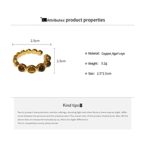 Fiche technique détaillée d'une bague oeil de tigre en cuivre doré, poids 3,2g, taille 2,5cm
