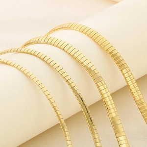 Flat snake chain necklace in 18K gold plated titanium steel with segmented link design