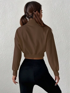 Brown cropped quarter-zip sweatshirt with stand collar in a relaxed athletic fit for women