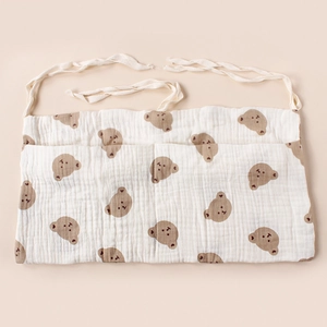 Dual-pocket cotton baby crib organizer with brown bear prints and hanging ties