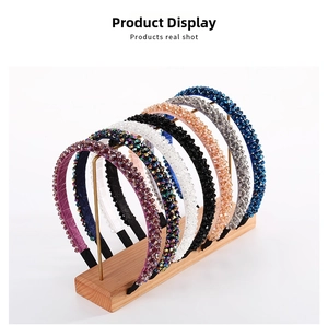 Detail of multi-layer crystal beaded headbands with sparkling glass rhinestones in various colors