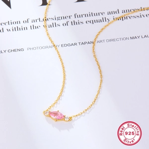 Detailed close-up of S925 sterling silver gold necklace with pink marquise zircon pendant