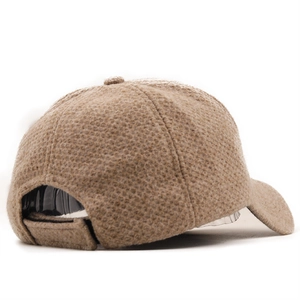 Retro corduroy baseball cap in oatmeal color with textured finish and adjustable back strap
