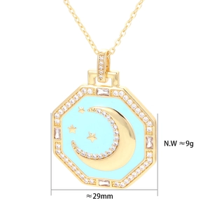 Detailed view of gold moon star enamel pendant with 29mm width and 9g weight info