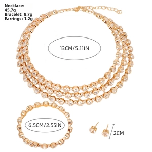 Detailed view of 3-piece gold bridal jewelry set with dimensions and crystal accents