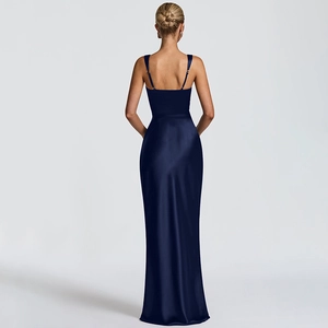Detail view of the deep blue satin long dress featuring a backless design and thin straps