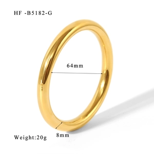 Polished gold hollow tube bangle showing 64mm inner diameter and 8mm thickness