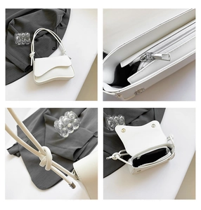 Detailed views of white small shoulder bag with knot strap and silver hardware accents
