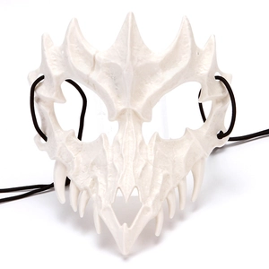 Detailed view of off-white dragon bone cosplay mask with black elastic strap for Halloween