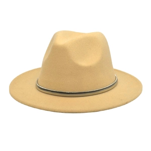 Detail of wool fedora hat in light camel with a decorative silver metal band buckle