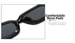 Detail of comfortable nose pads on small square sunglasses made of glossy black acetate