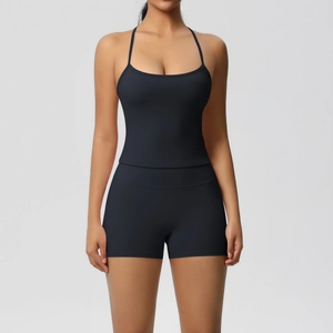 Close-up of black double-sided brushed fabric on tight-fit yoga tank top and shorts set