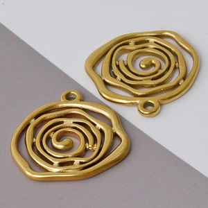Detailed view of matte gold 304 stainless steel spiral rose charm pendant for jewelry