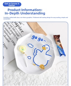 Detail of cartoon duck self-sealing pouch with candy snacks and lollipops inside