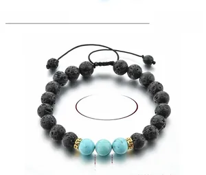 Détail du bracelet de yoga en pierre de lave 8mm avec perles bleues et séparateurs dorés