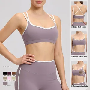 Contrast trim sports bra with cross back design and removable pads in lotus pink
