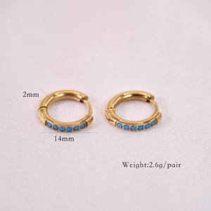 Detail view of 14mm gold hoop earrings with blue stones and dimension measurements