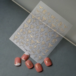 Gold embossed 5D butterfly nail art stickers with vintage star and moon patterns