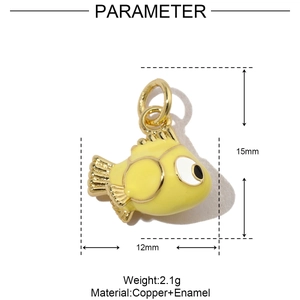 Detail view of a yellow enamel fish pendant with dimensions of 12mm by 15mm