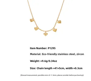 Macro shot of gold plated heart MAMA pendant with zircon stones and adjustable chain detail