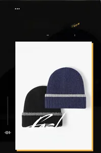 Close-up of knit hats in black and navy with gray stripes and thick ribbed texture