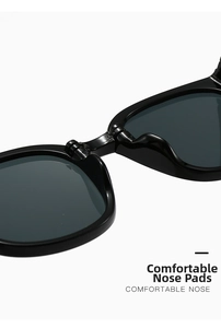 Close-up of comfortable integrated nose pads on black foldable kids sunglasses