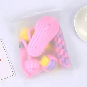 Pink and purple cotton rope dog toy set packaged in a frosted zipper bag for pets