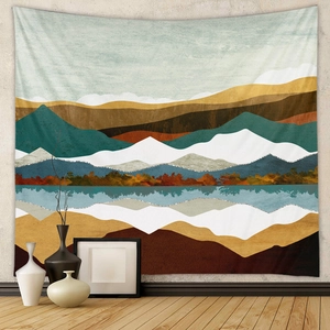 Detail of abstract landscape tapestry with textured woven fabric and mountain scenery