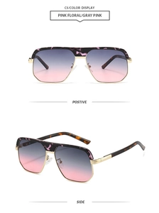 Detail view of pink floral large frame sunglasses with gradient lenses and metal temples
