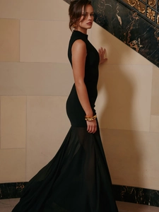 Elegant sleeveless slim-fit black mermaid dress with sheer chiffon hemline detailing