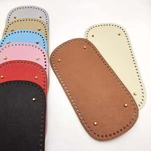Macro detail of oval PU leather bag base parts with pre-punched holes and metal rivets