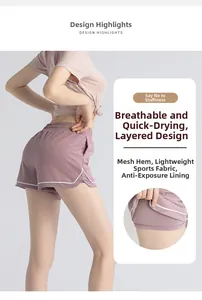 Detail of mauve pink double-layer sports shorts with breathable mesh and anti-exposure liner