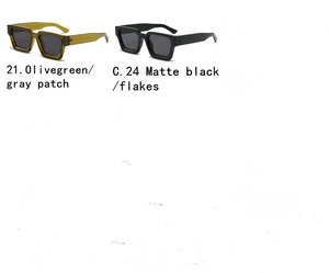 Detail view of square sunglasses in olive green and matte black with gray lenses