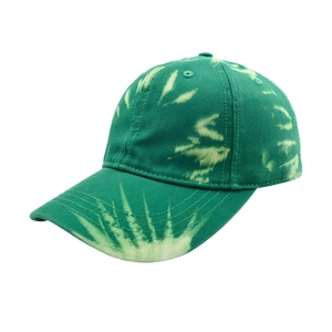 Close-up of green tie-dye baseball cap with 6-panel structure and cotton twill texture