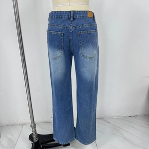 Detailed back view of vintage wash high waist straight denim jeans with rear pockets