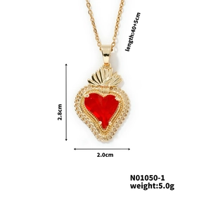 Detailed view of red heart pendant with dimensions 2.8cm x 2.0cm and gold chain length