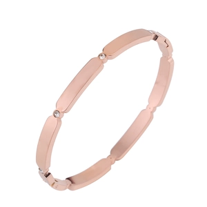 Rose gold stainless steel oval bangle with sparkling clear crystal inlay for women