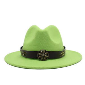 Detailed close-up of green wool felt fedora featuring a vintage bronze floral buckle