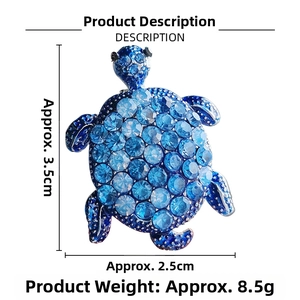 Detail showing blue rhinestone turtle brooch dimensions 3.5cm by 2.5cm and 8.5g weight