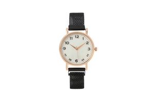 Detail of rose gold watch case with white dial and black mesh band for women