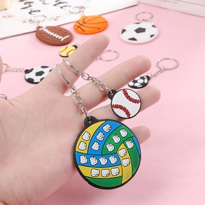 Handheld PVC sports keychain set featuring detailed volleyball and baseball pendants