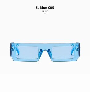 Detail shot of rectangular blue transparent frames with metallic hinge rivet accents